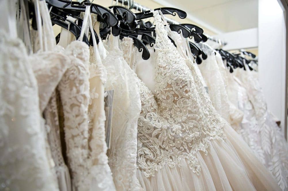 Wedding vendors meeting couples at their exhibitor stands