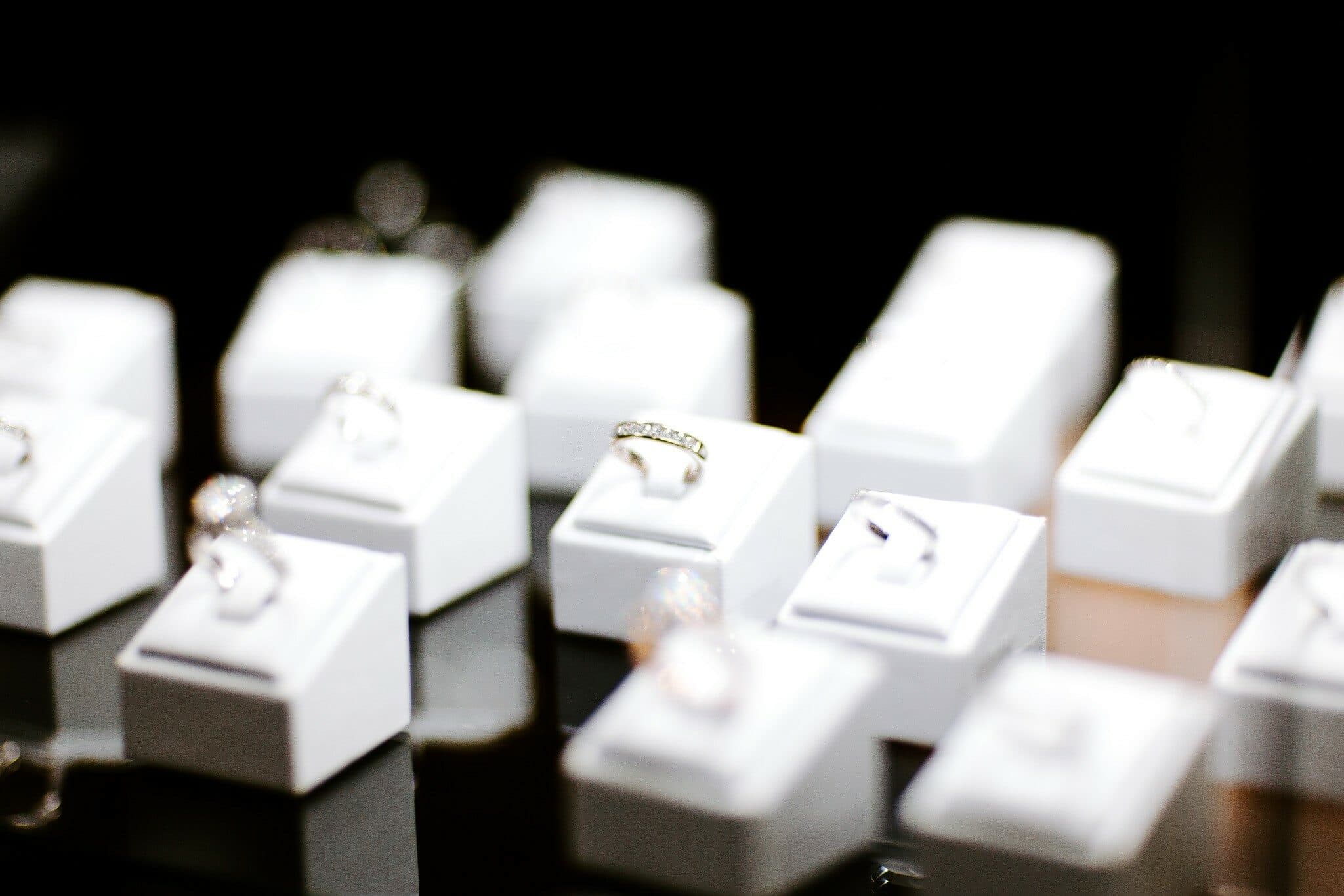 Couples speaking with trusted wedding vendors at an expo