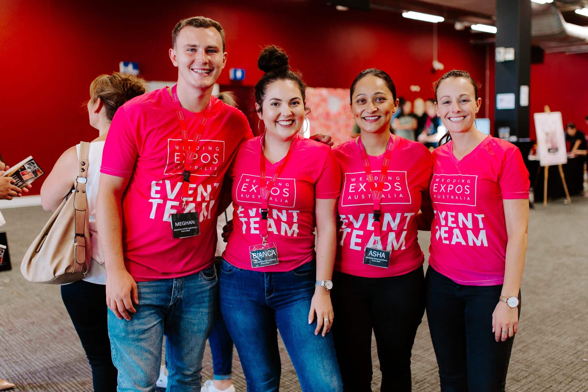 Couple reviewing wedding plans at an expo